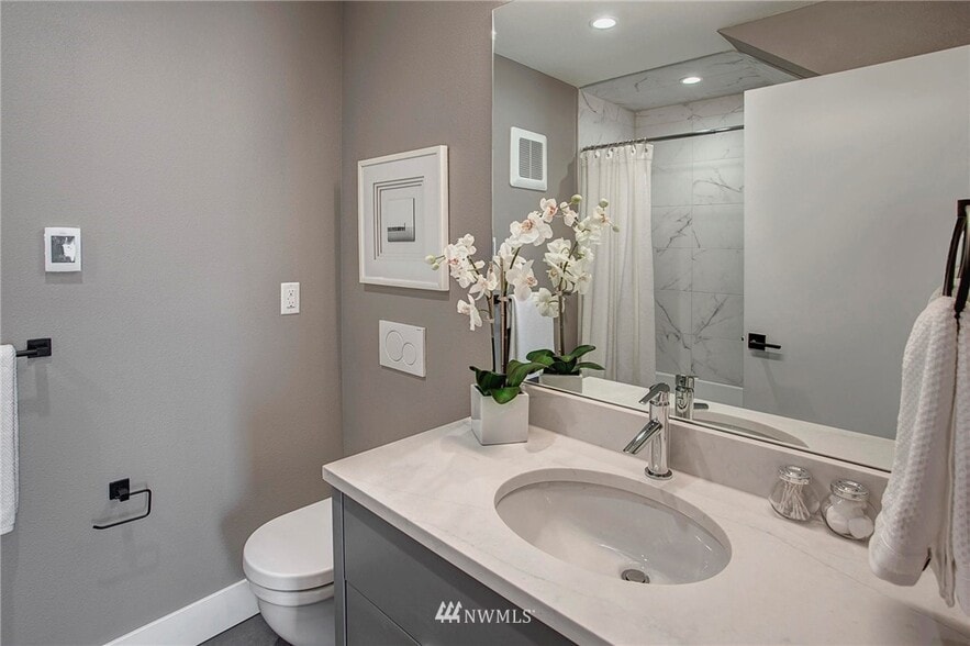 1st floor spa-like full bath - 2210 12th Ave W