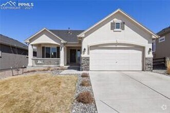 Building Photo - Beautiful stucco 4 bed rancher on premium ...