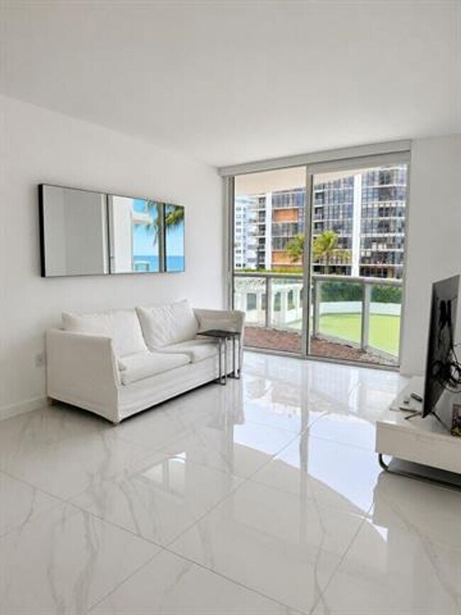 Building Photo - 6365 Collins Ave