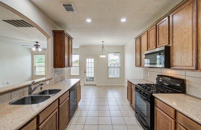 Building Photo - 14555 Gleaming Rose Dr