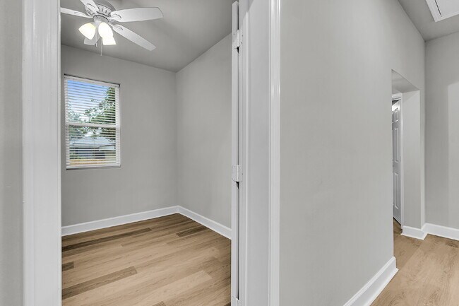 Building Photo - Cute all brick ranch on a large corner lot with fenced in yard and 1 car garage