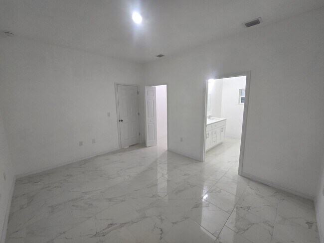 Building Photo - BRAND NEW THREE BEDROOM, 2 BATH, 1 CAR GAR...