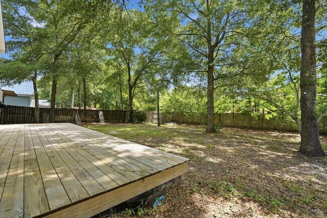 Building Photo - New rental move in ready! 4 bedrooms | 2 bathooms