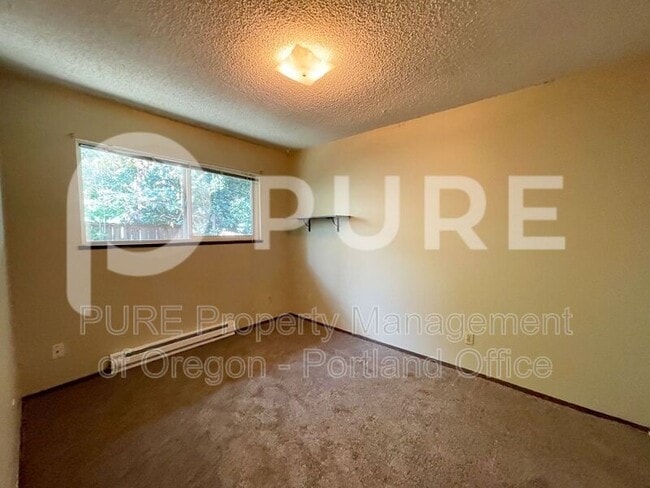 Building Photo - 527 NE 63rd Ave