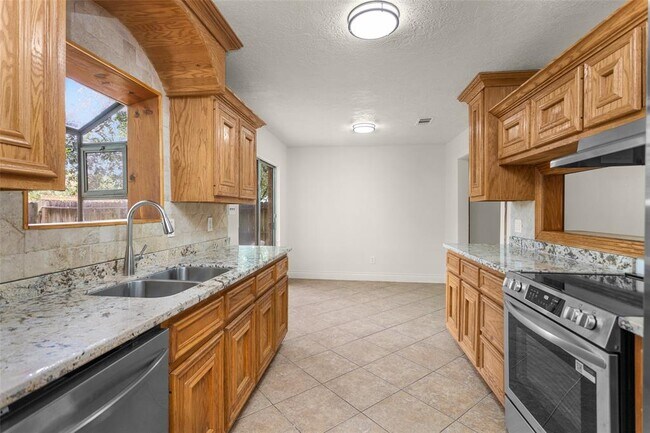 Building Photo - 9810 Kiwi Ln
