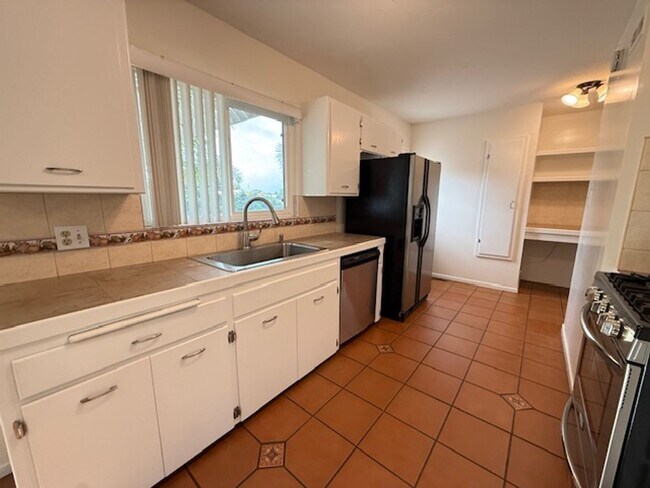 Building Photo - College View Estates Gem – Spacious 3BR Home with Private Yard & RV Parking