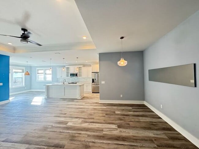 Building Photo - Palm Heaven!!Application and more info @ https://www.sandseekerrealty.com/long-term-rentals/. Cli...