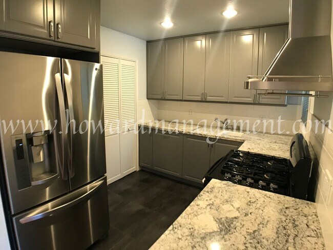 Building Photo - Beautiful lower condo with large patio in Tara Hills, a resort style living complex!