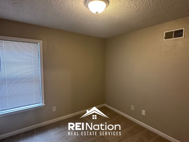 Building Photo - NEWLY RENOVATED! Massive 4BR/2BA Bartlett Stunner | Hardwoods & Fireplace!