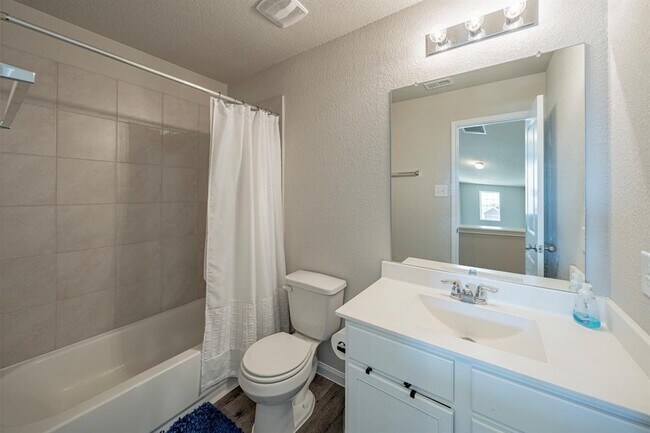 Building Photo - 4923 Blue Jacaranda Wy