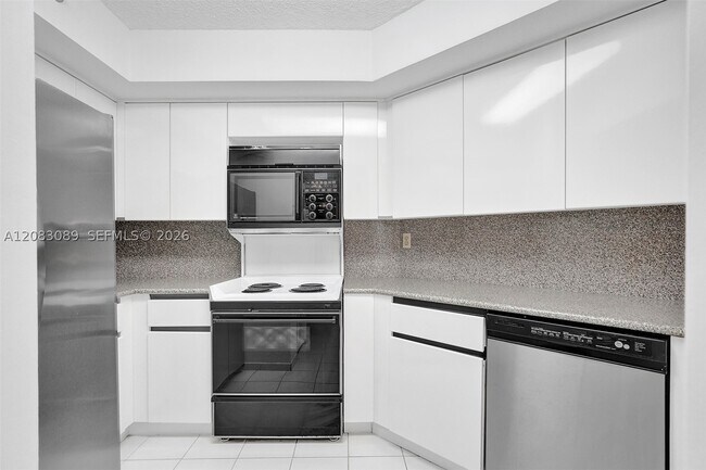 Building Photo - 6767 Collins Ave