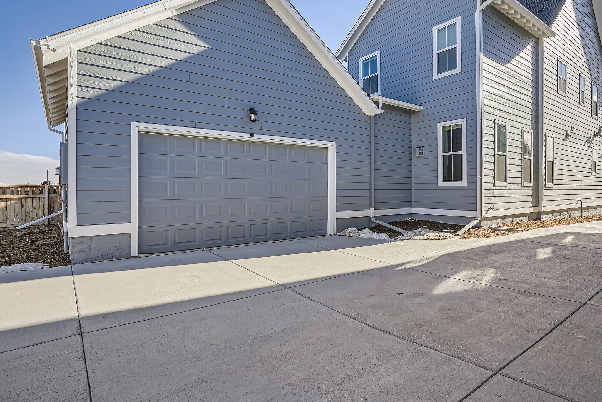 rear-loading 2 car garage - 21235 E 61st Dr