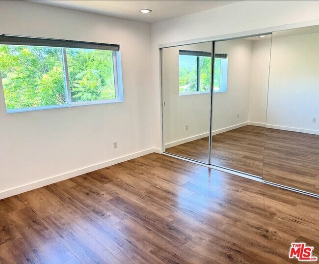 Building Photo - 5638 Woodman Ave