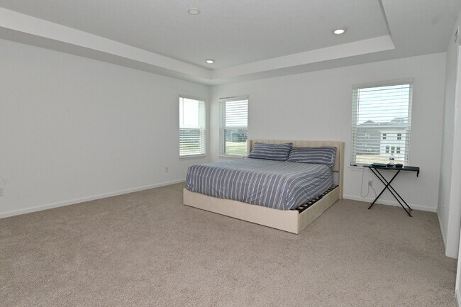 Building Photo - "Spacious 5-Bedroom Retreat with Luxurious Quartz Countertops & Fireplace on Deerberg Drive!"