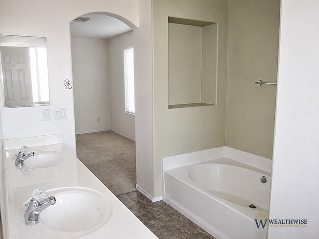 Building Photo - Now Available! Spacious 3 Bedroom Home with Den in Rita Ranch