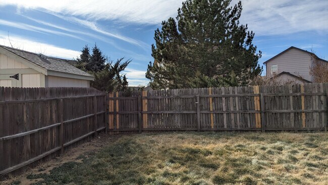 Building Photo - SPRINGS RANCH 3 BEDROOM/2 BATHROOM RANCH WITH FENCED YARD AND 2 CAR GARAGE!