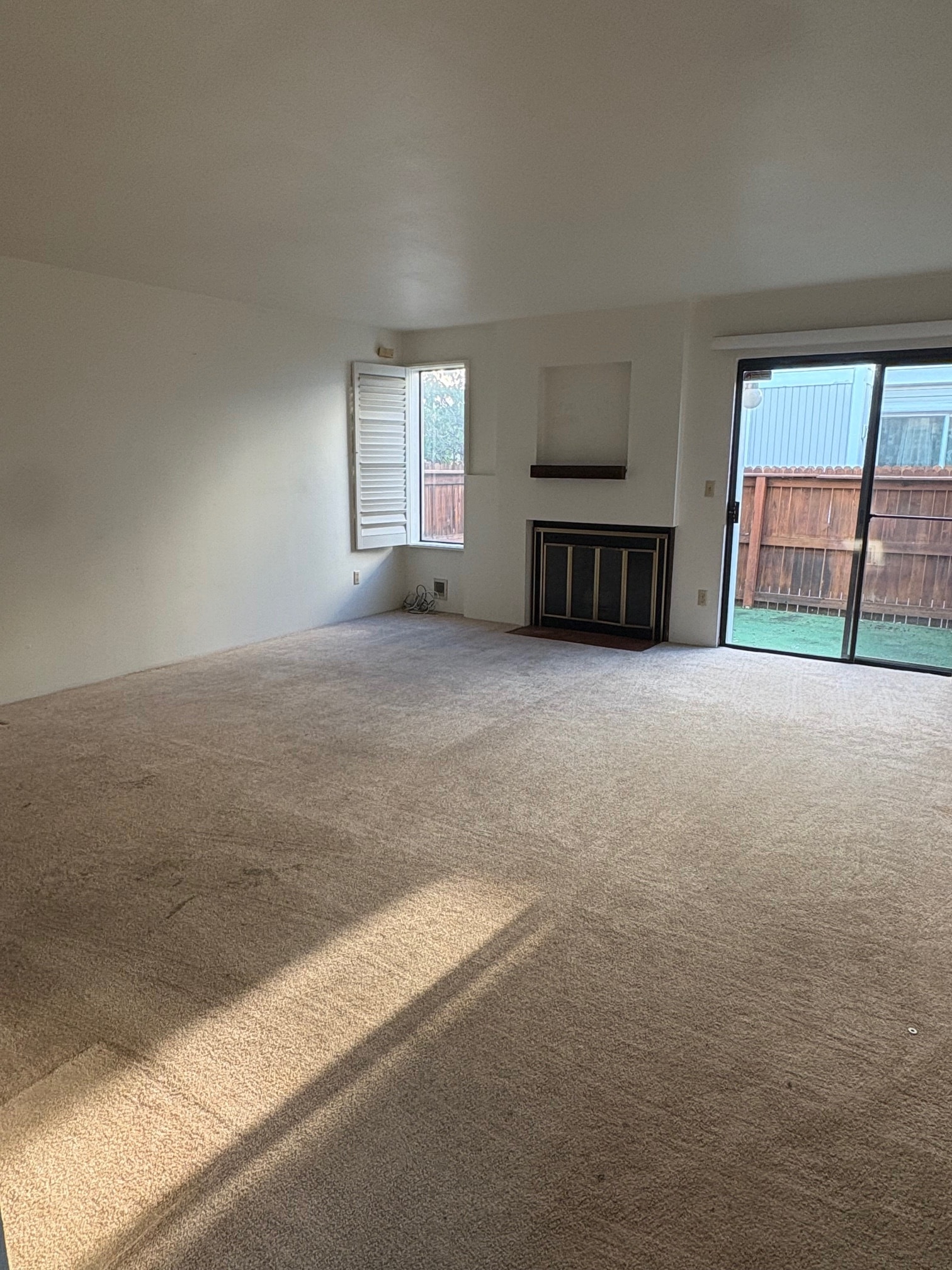 Spacious Living Room with Fireplace - 1050 S Monaco Pky