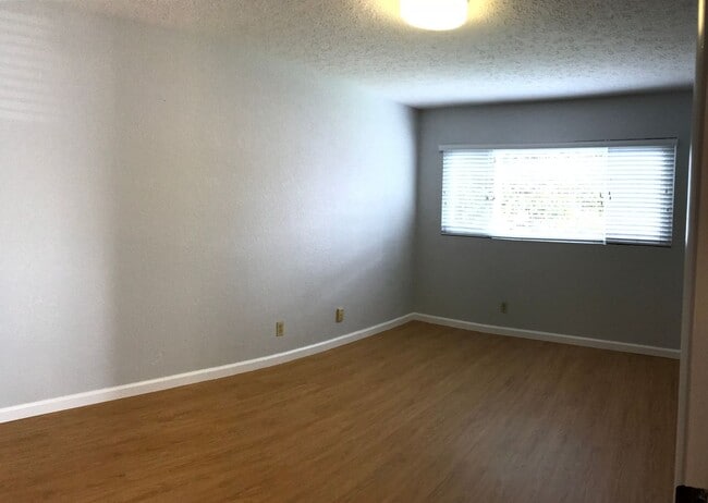 Building Photo - Spacious 5 Bedroom, 2 Bath, 2 Car Carport,...