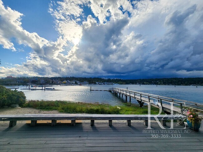 Building Photo - Waterfront Living in Indianola – Dock, Bea...