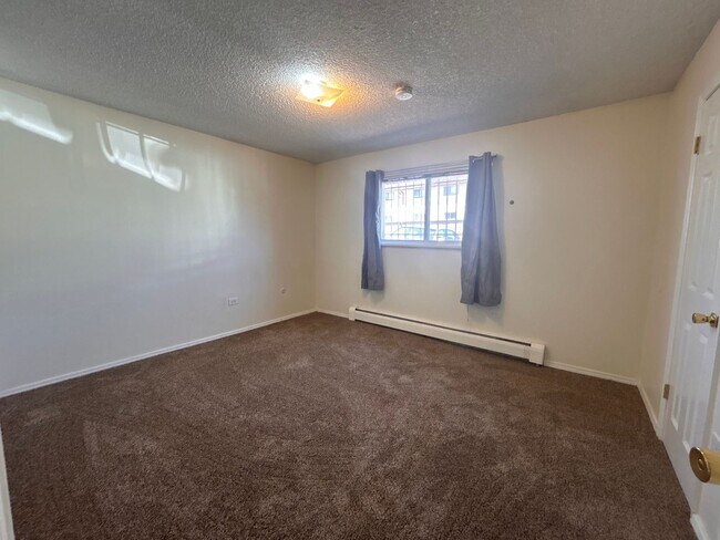 Building Photo - $0 DEPOSIT OPTION, CHARMING 1-BEDROOM CONDO IN FORT LOGAN WITH MODERN UPGRADES