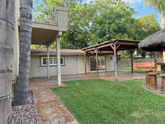 Building Photo - Gated estate with a backyard oasis