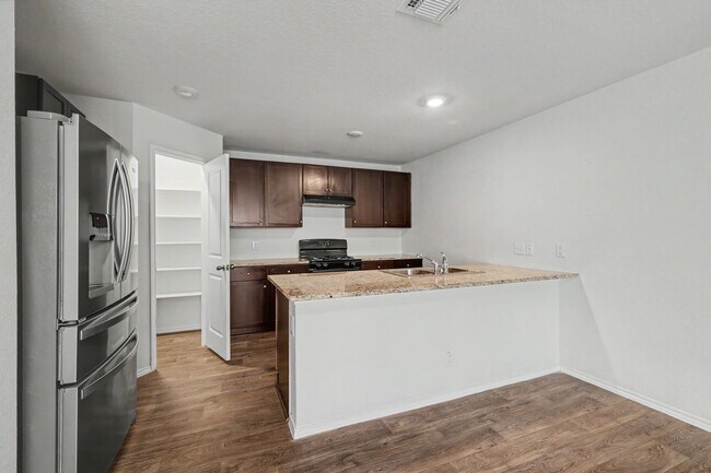 Building Photo - Spacious 4BR w/ Private Yard, Game Room & Primary Suite Downstairs | Appliances Included