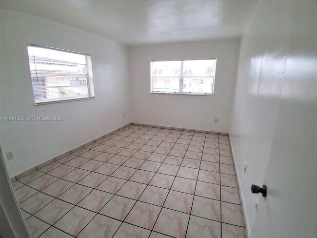 Building Photo - 7860 Harding Ave