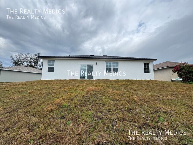 Building Photo - Available March 11th! Spacious 4-Bedroom H...