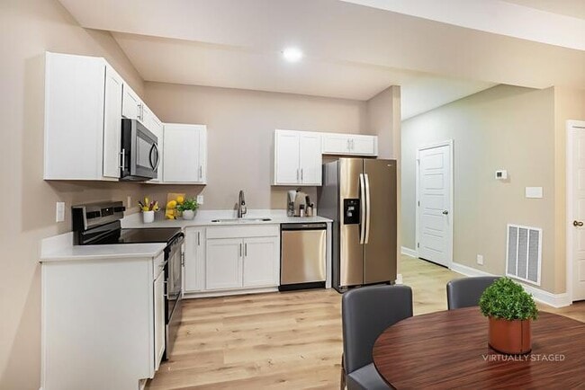 Building Photo - Modern Townhome with Attached Garage and Stainless Steel Appliances