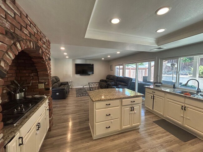 Building Photo - Upgraded 4-Bedroom Home in Gated Green Riv...