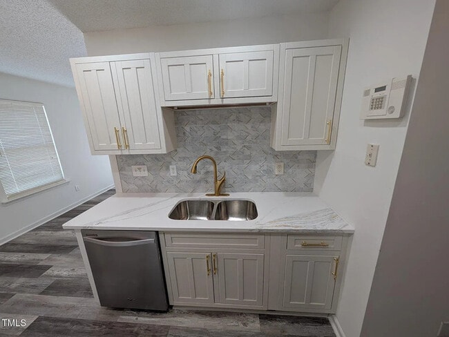 Building Photo - Earn Wealth While Leasing - Like a Homeown...