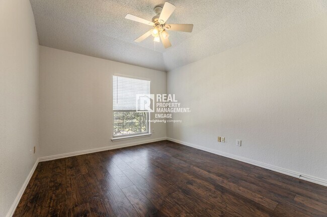 Building Photo - Recently Updated Plano Property with Modern Features and Serene Surroundings