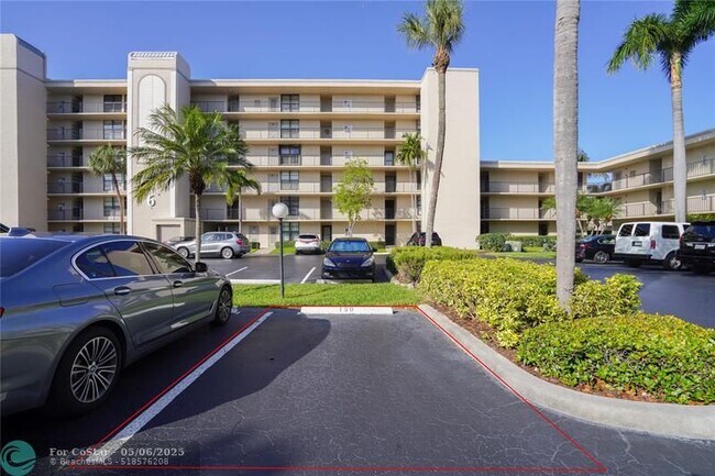 Building Photo - 7 Royal Palm Way