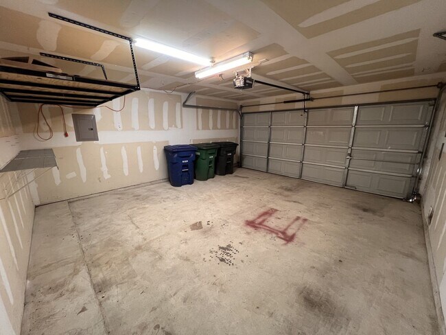 Building Photo - Generous Outdoor Space & Lawn Care Included!