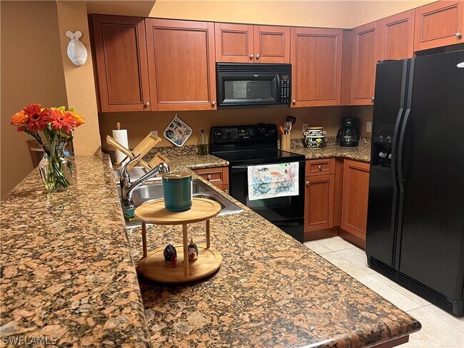 Building Photo - 10110 Villagio Palms Way