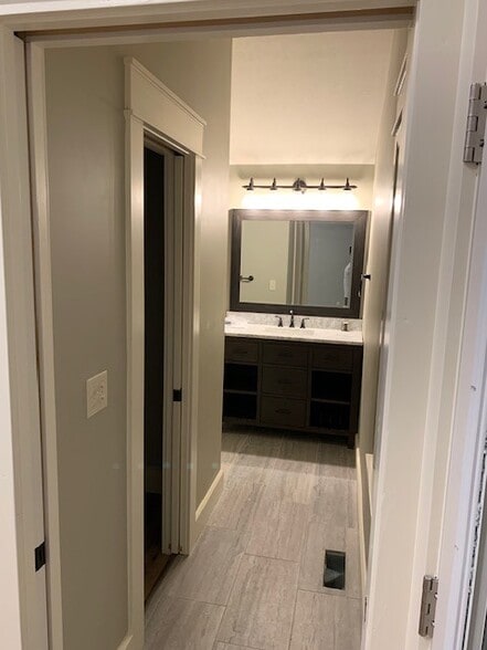 walk-in closet and master bath - 607 W Duncan Dr