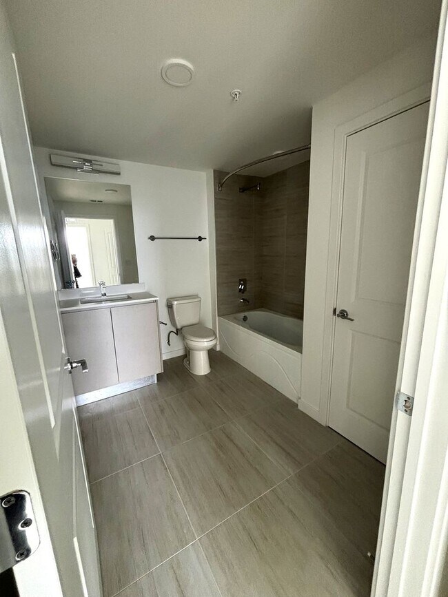 Building Photo - Beautiful and Brand New Apart in Millenia Park Orlando