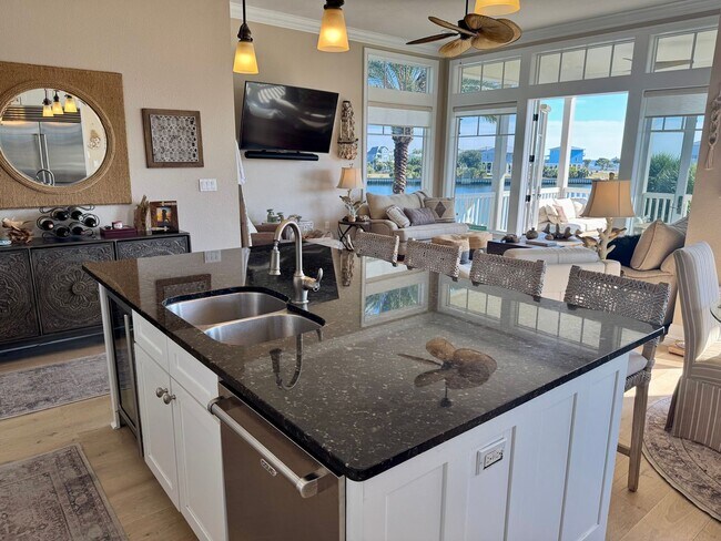 Building Photo - Waterfront Shell Point Home with Dock, Hot Tub, Elevator, & Golf Cart