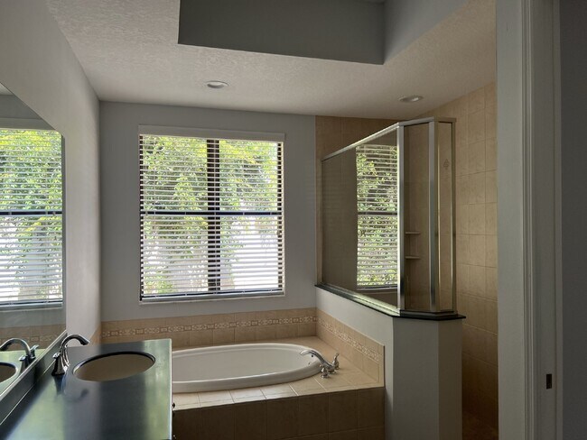 Building Photo - "Elegant 3-Bed, 3-Bath Home with a heated ...