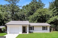 Building Photo - 9073 Woodgreen Way