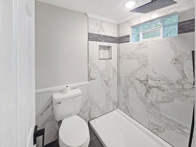 Building Photo - COMPLETELY RENOVATED 4 Bedroom/2 Bath Harv...