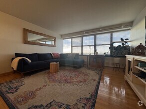 Building Photo - Sunny 1bd condo with updated kitchen & upd...