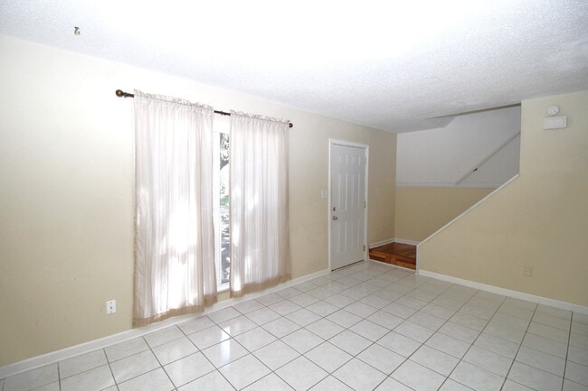 Building Photo - 2-Bedroom Waterfront Townhouse with Community Pool – Available 11/26