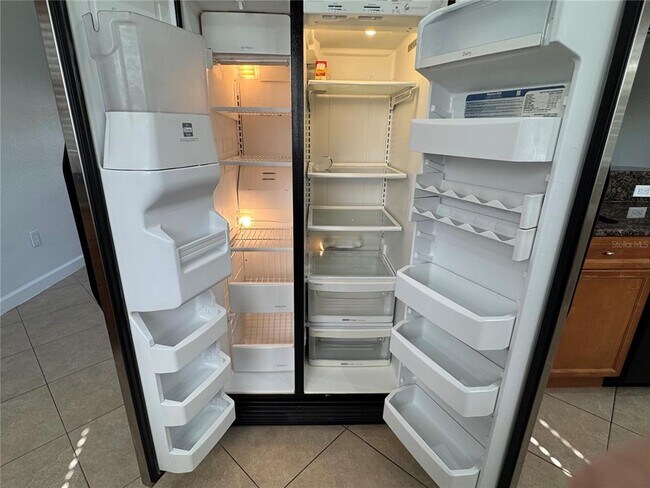 Building Photo - 14940 Day Lily Ct