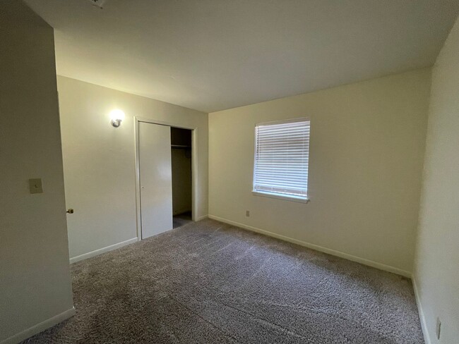 Building Photo - A Great Place to Call Home! Master Bedroom...