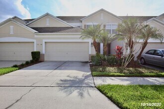 Building Photo - Beautiful 3/3.5 Townhome with a Spacious 2 Car Garage in the Gate Guarded Community of Spring Isl...
