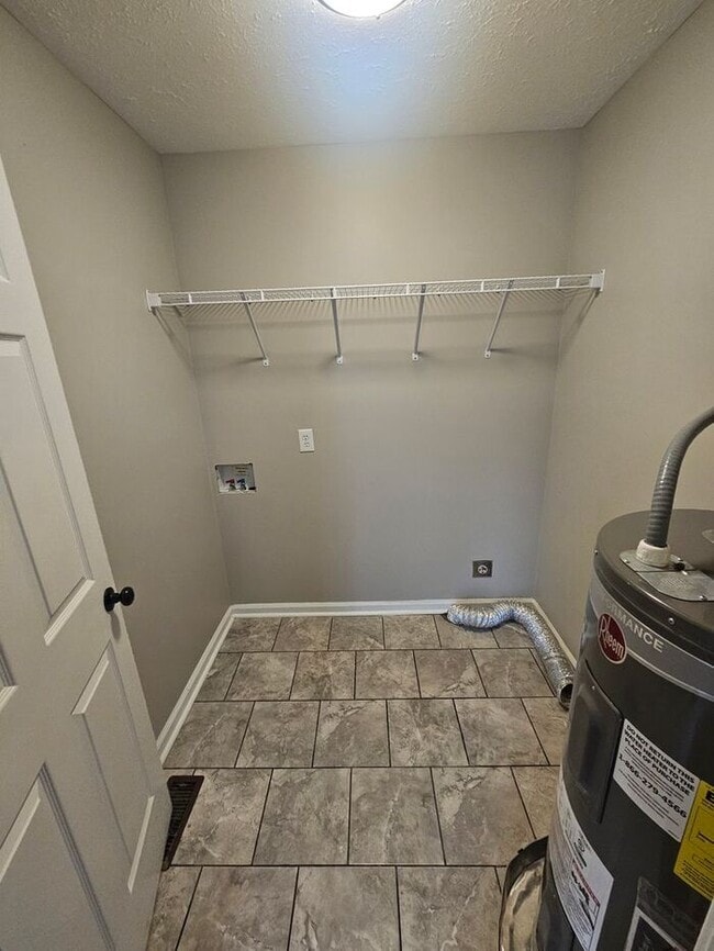 Building Photo - Discover comfort, convenience, and modern ...