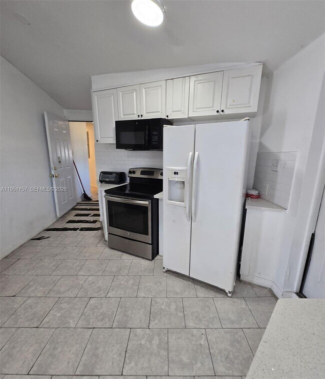 Building Photo - 1189 N Tamiami Trl