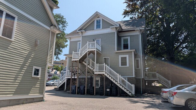 Building Photo - Spacious Townhouse: 4-bed, 3.5 bath unit in Brighton with Garage Parking