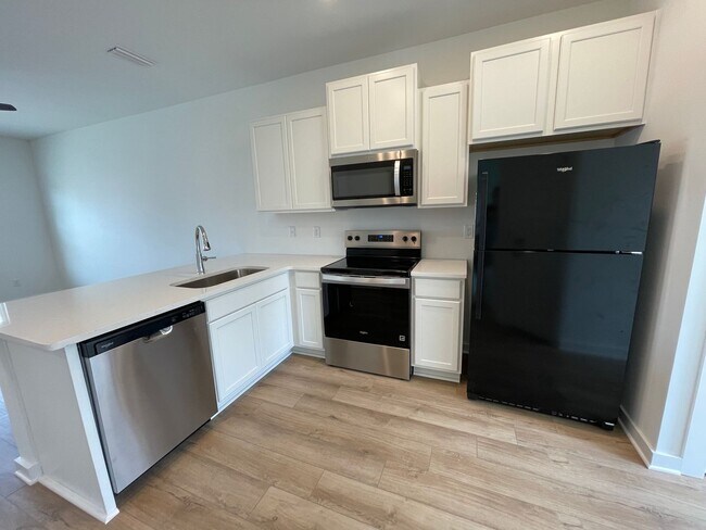 Building Photo - For Lease - Brand New 3 BR|3 BA Townhome